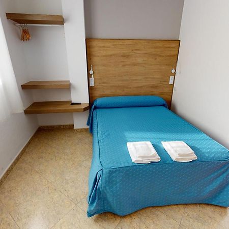 Pensión Portomiño Portomarín Quarto foto